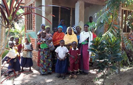 Some of the women and children in front of the future emergency hospital that we are helping to complete and put into operation